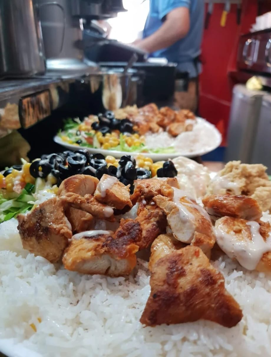 Grilled chicken with rice — freshly prepared on site